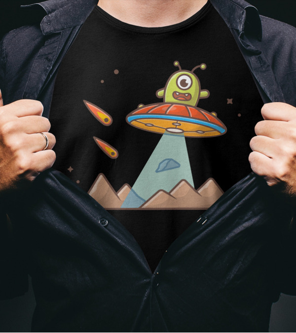 Cute Alien In UFO Hovering Over Mountains With Meteorites T-Shirt