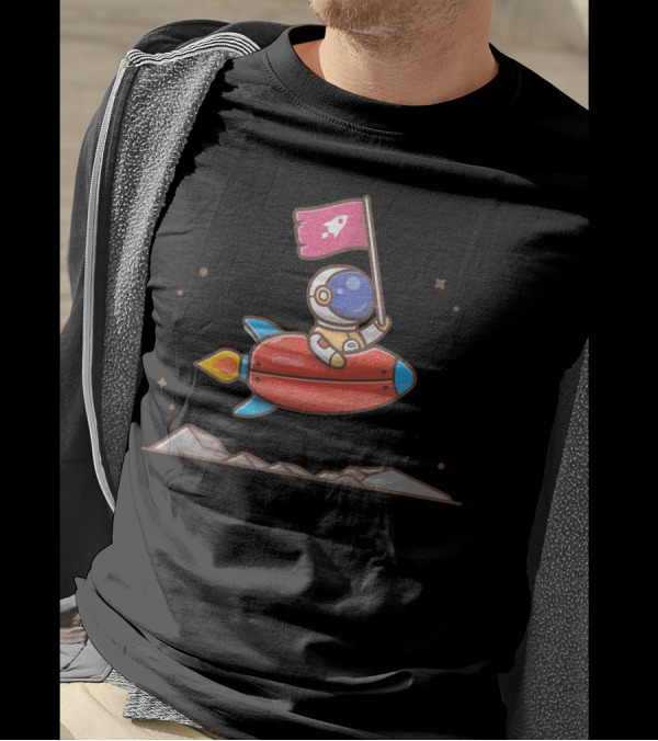 Cute Astronaut Holding Flag On Rocket In Space Scene T-Shirt