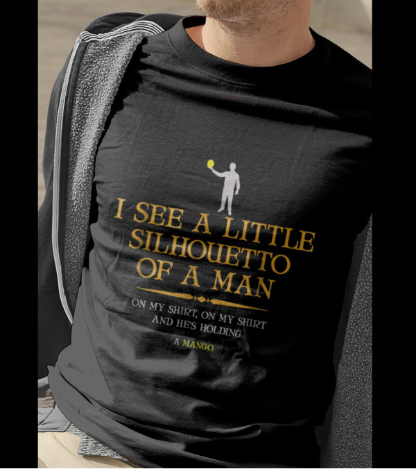I See A Little Silhouetto Of A Man On My Shirt And He's Holding A Mango T-Shirt