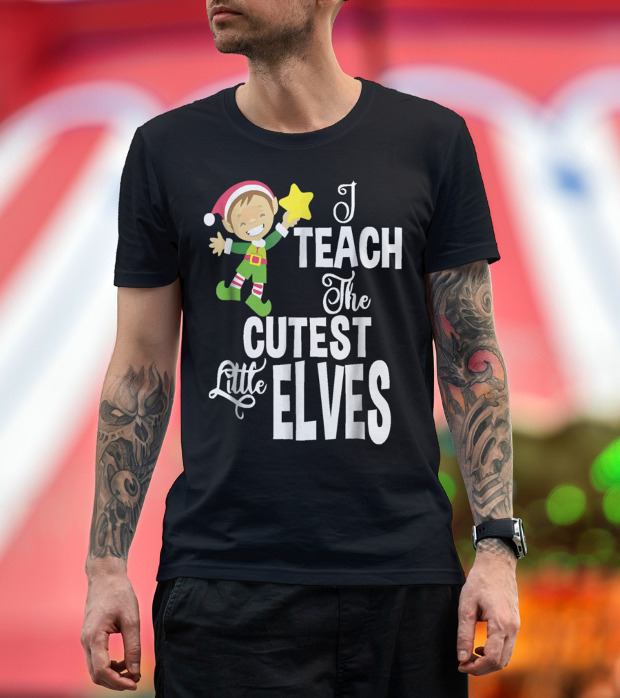I Teach The Cutest Little Elves Teacher Christmas Elf Holding Star T-Shirt