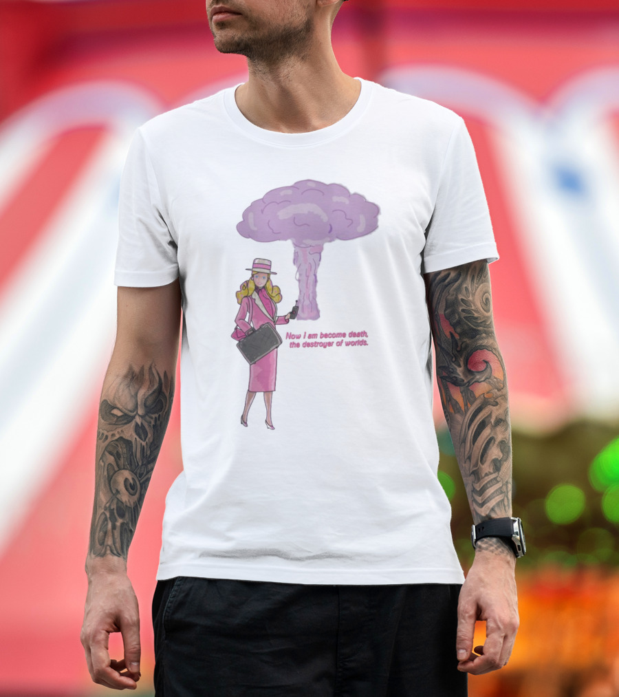 Now I Am Become Death The Destroyer Of Worlds Blonde Woman Pink Outfit Holding Bag Phone With Purple Mushroom Cloud T-Shirt