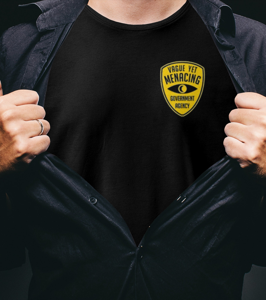 Vague Yet Menacing Government Agency Yellow Badge With Eye T-Shirt