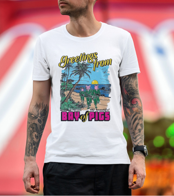 Premium T-Shirt: Greetings From The Beautiful Bay Of Pigs With Pig-Headed Soldiers and Tropical Beach Scene T-Shirt Greetings From The Beautiful Bay Of Pigs With Pig-Headed Soldiers and Tropical Beach Scene T-Shirt