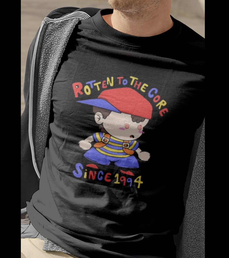 Rotten To The Core Since 1994 Cartoon Character With Red Cap And Striped T-Shirt