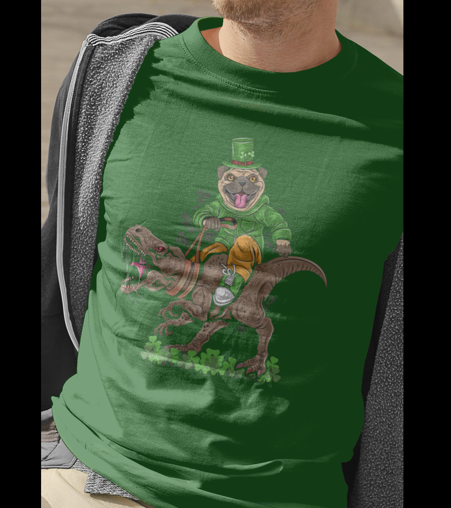 St Patricks Day Pug Puppy Riding Dinosaur Rex With Shamrocks And Leprechaun Hat T-Shirt