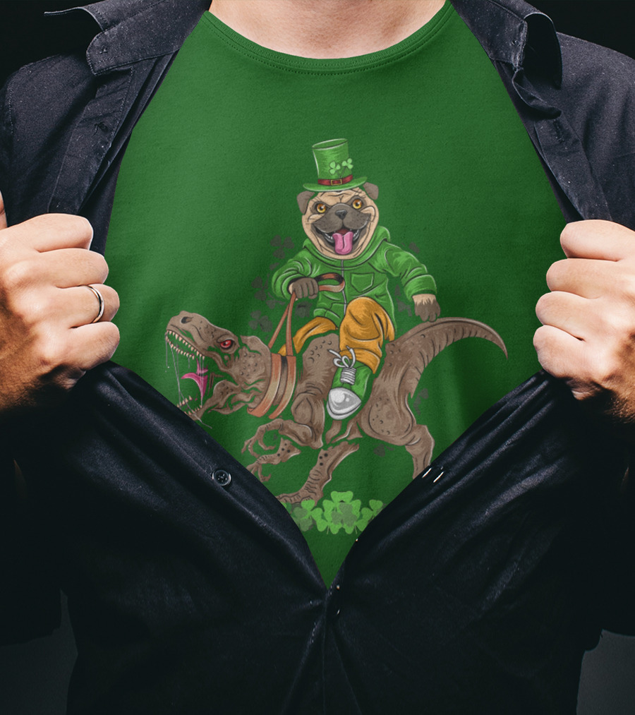 St Patricks Day Pug Puppy Riding Dinosaur Rex With Shamrocks And Leprechaun Hat T-Shirt