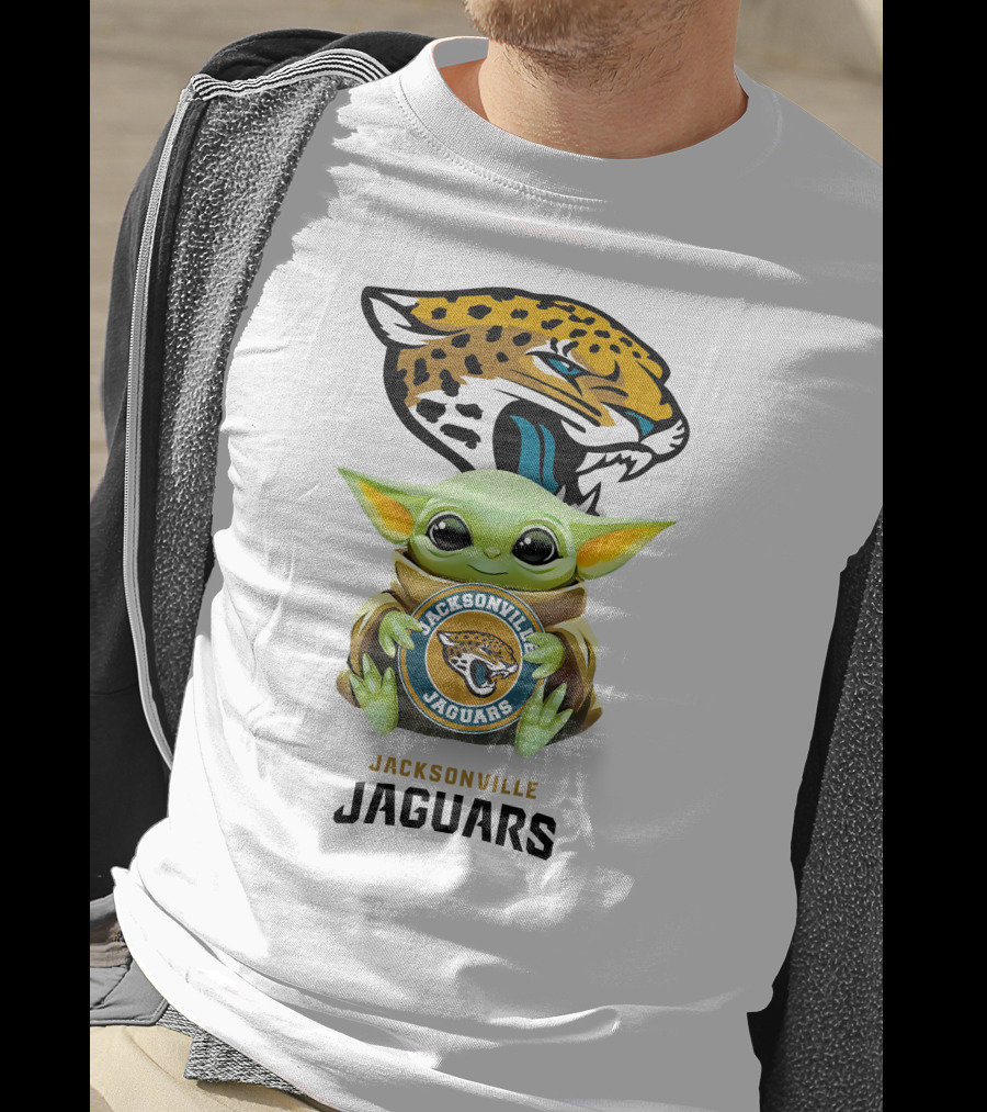 Grogu Holding Jacksonville Jaguars Badge With Mascot In Background T-Shirt