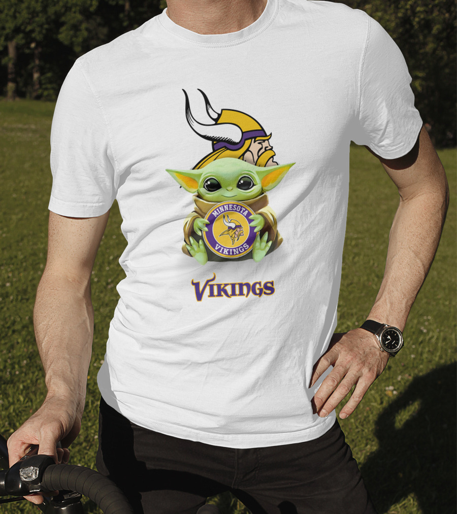 Grogu Holding Minnesota Vikings Symbol With Viking Helmet Background T-Shirt