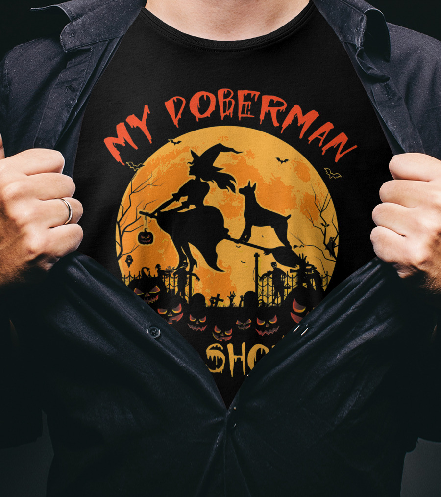 My Doberman Rides Shotgun Halloween Witch And Pumpkins Moon Scene T-Shirt