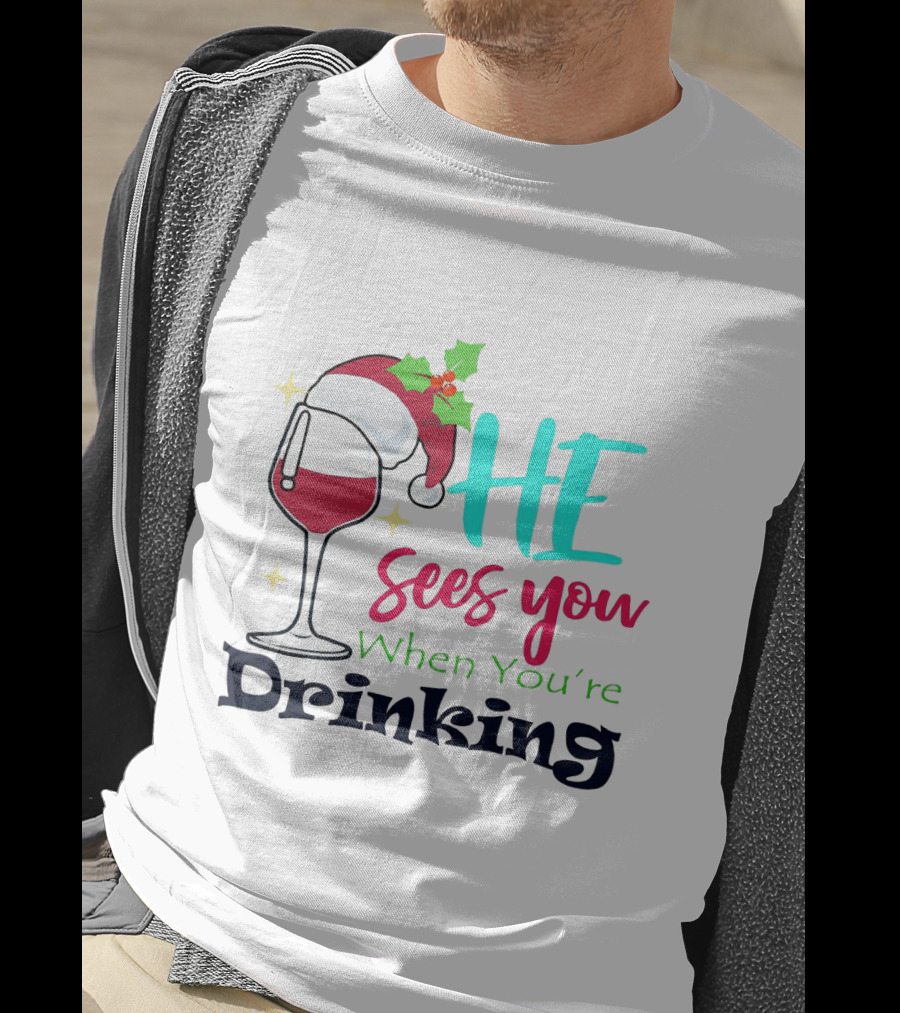 Santa Hat On Wine Glass With 'He Sees You When You're Drinking' Christmas Festive T-Shirt