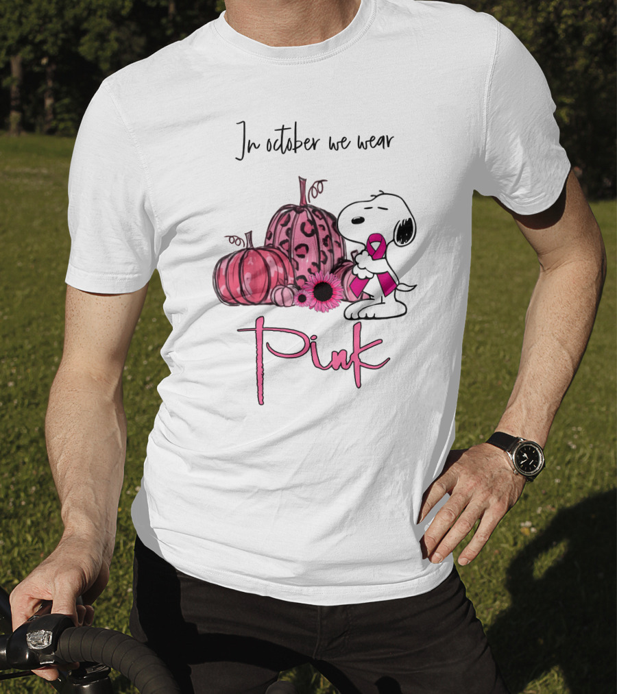 In October We Wear Pink With Peanuts Character Holding Ribbon And Pumpkins T-Shirt