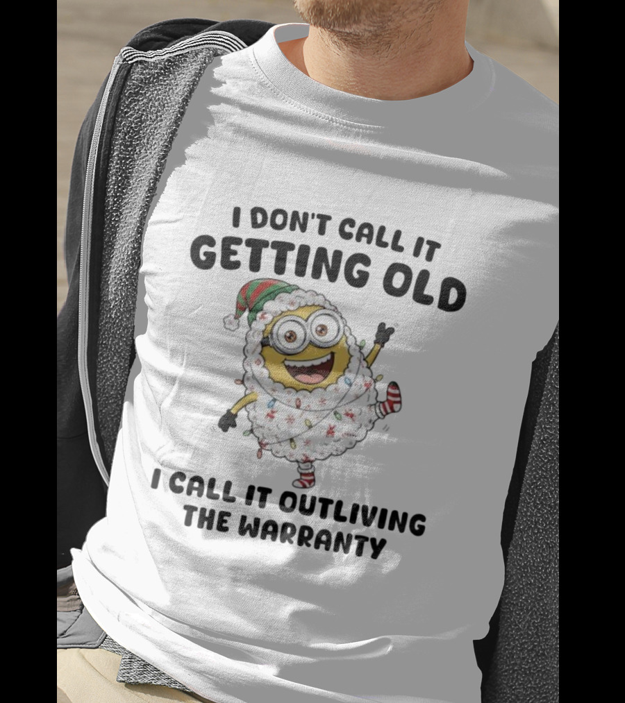 Minion Wrapped In Christmas Lights Santa Outfit I Don’t Call It Getting Old Outliving The Warranty T-Shirt