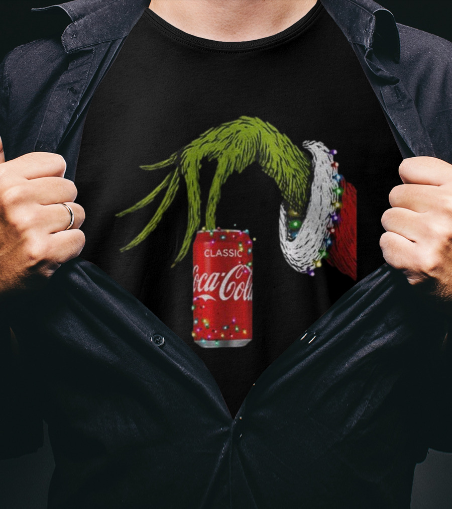 Grinch Hand Holding Coca-Cola Can Wrapped In Christmas Lights Merry Christmas T-Shirt