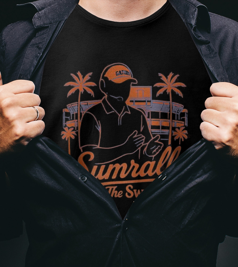 Sumrall The Swamp Coach Illustration With Palm Trees And Building Background T-Shirt