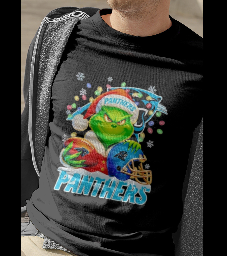 Grinch Santa Hat Holding Carolina Panthers Football And Helmet Merry Christmas T-Shirt