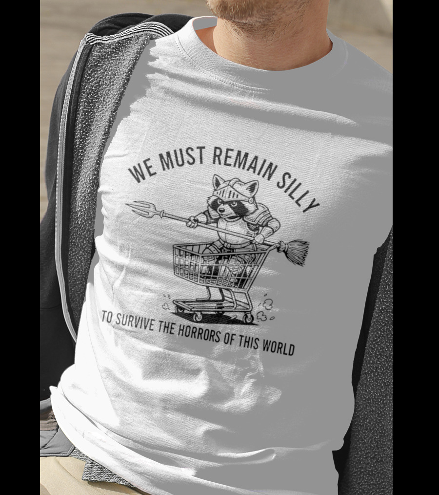 Raccoon Knight In Shopping Cart We Must Remain Silly To Survive The Horrors Of This World T-Shirt