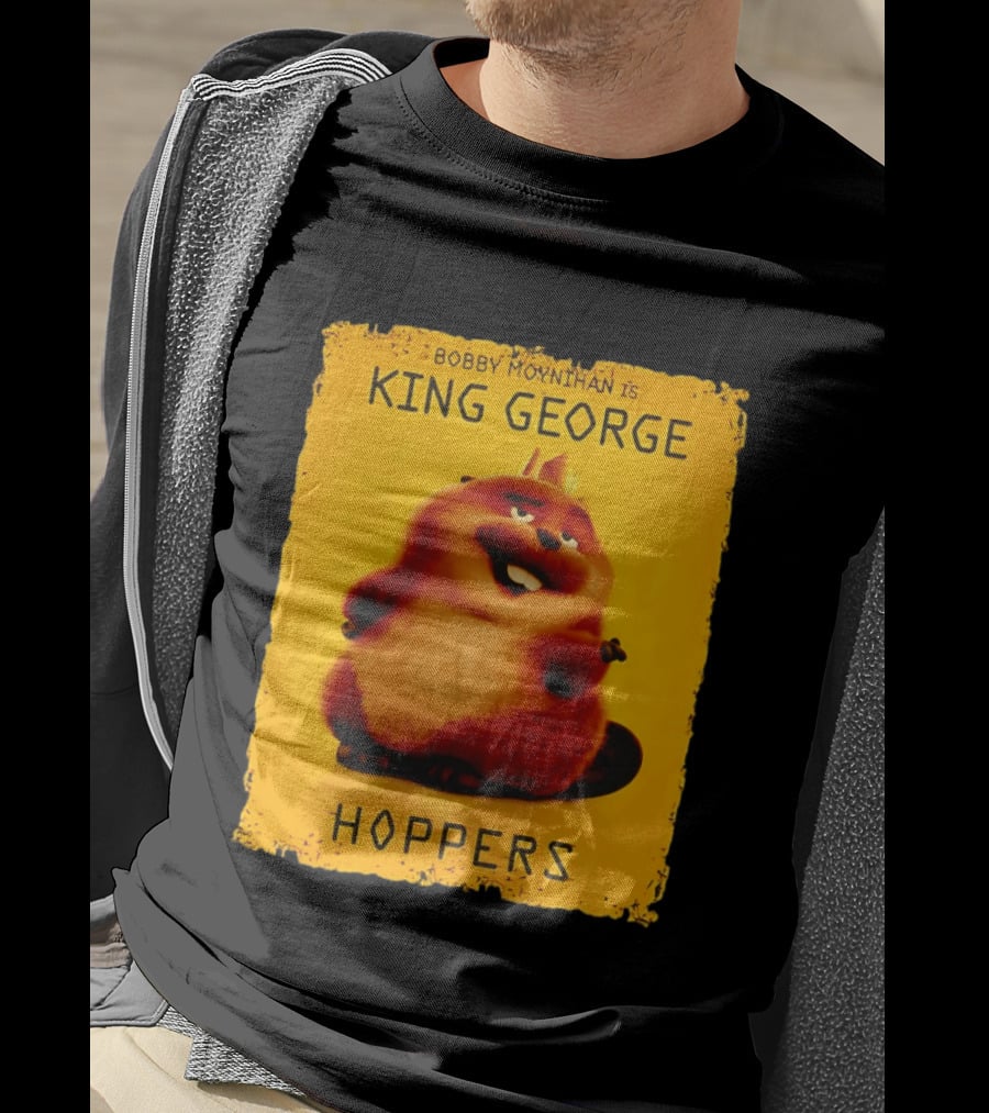 Bobby Moynihan Is King George Hoppers Smiling Cartoon Character With Crown On Orange T-Shirt