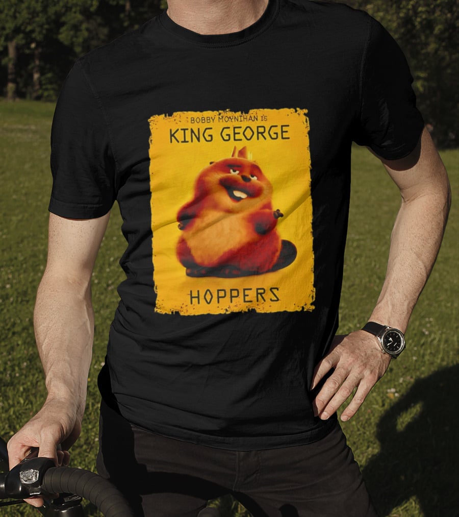 Bobby Moynihan Is King George Hoppers Smiling Cartoon Character With Crown On Orange T-Shirt
