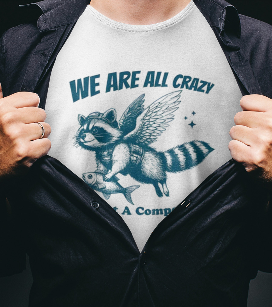 Raccoon With Wings Holding Fish We Are All Crazy It's Not A Competition T-Shirt