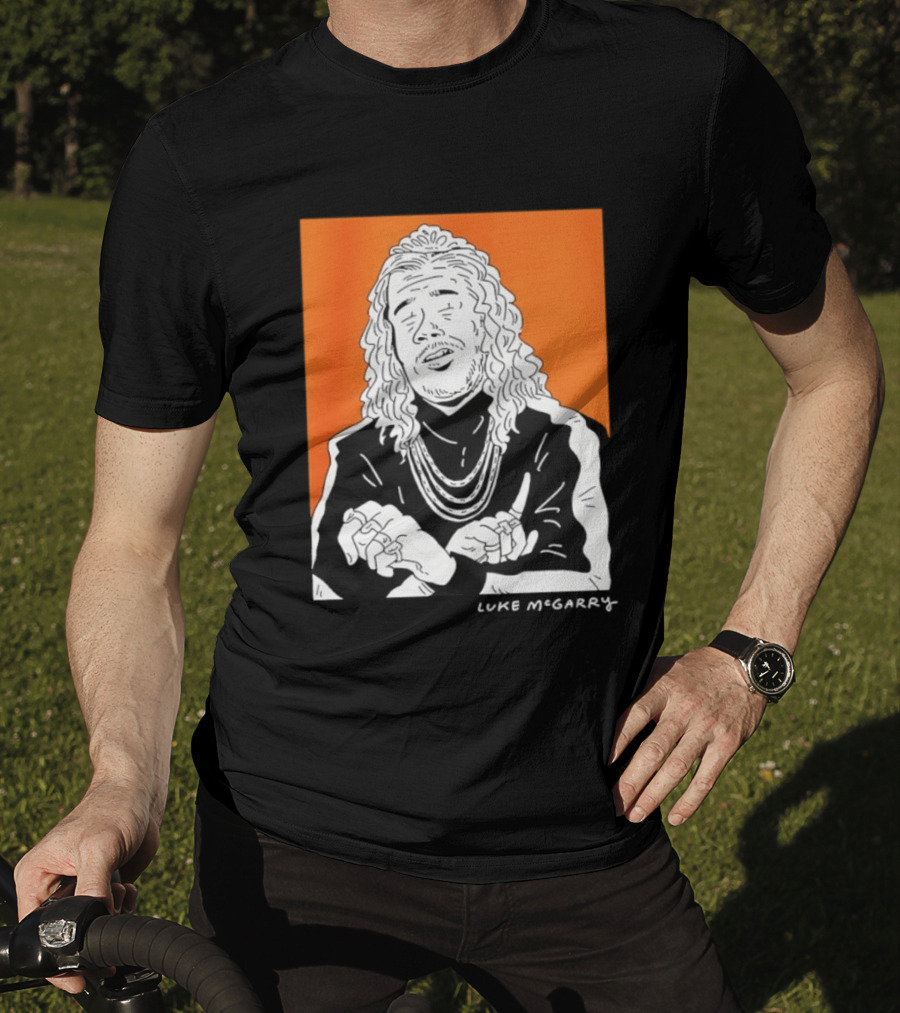 Luke McGarry Cartoon Character With Long Hair And Chains On Orange T-Shirt