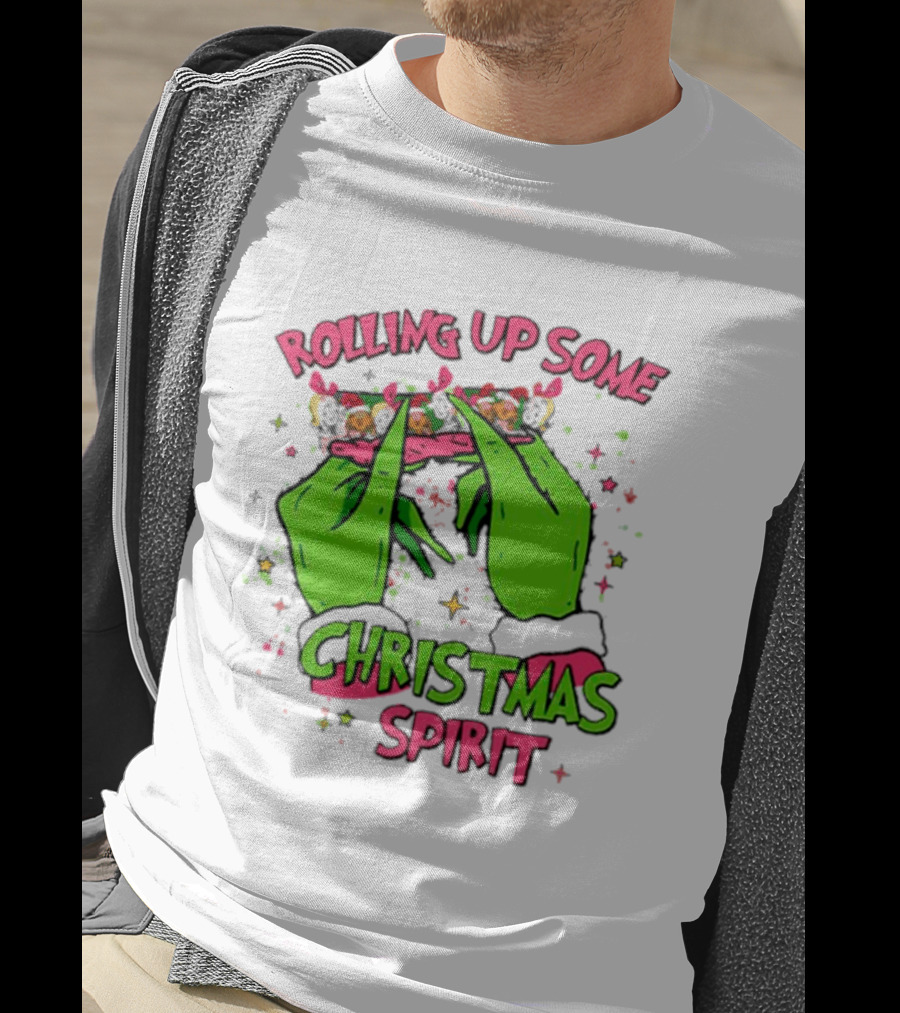 Grinch Rolling Up Some Christmas Spirit With Green Hands And Glitter Stars T-Shirt