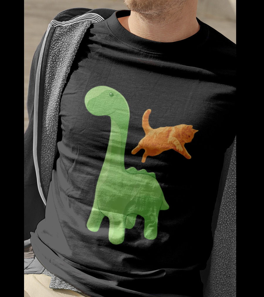 Cat Jumping Over Green Dinosaur Cartoon Image T-Shirt