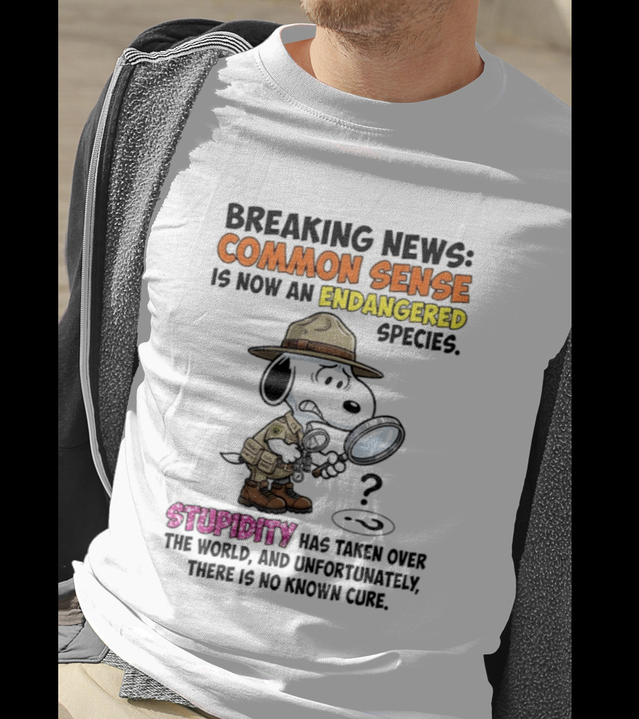 Breaking News Common Sense Endangered Species Stupidity Taken Over Snoopy T-Shirt