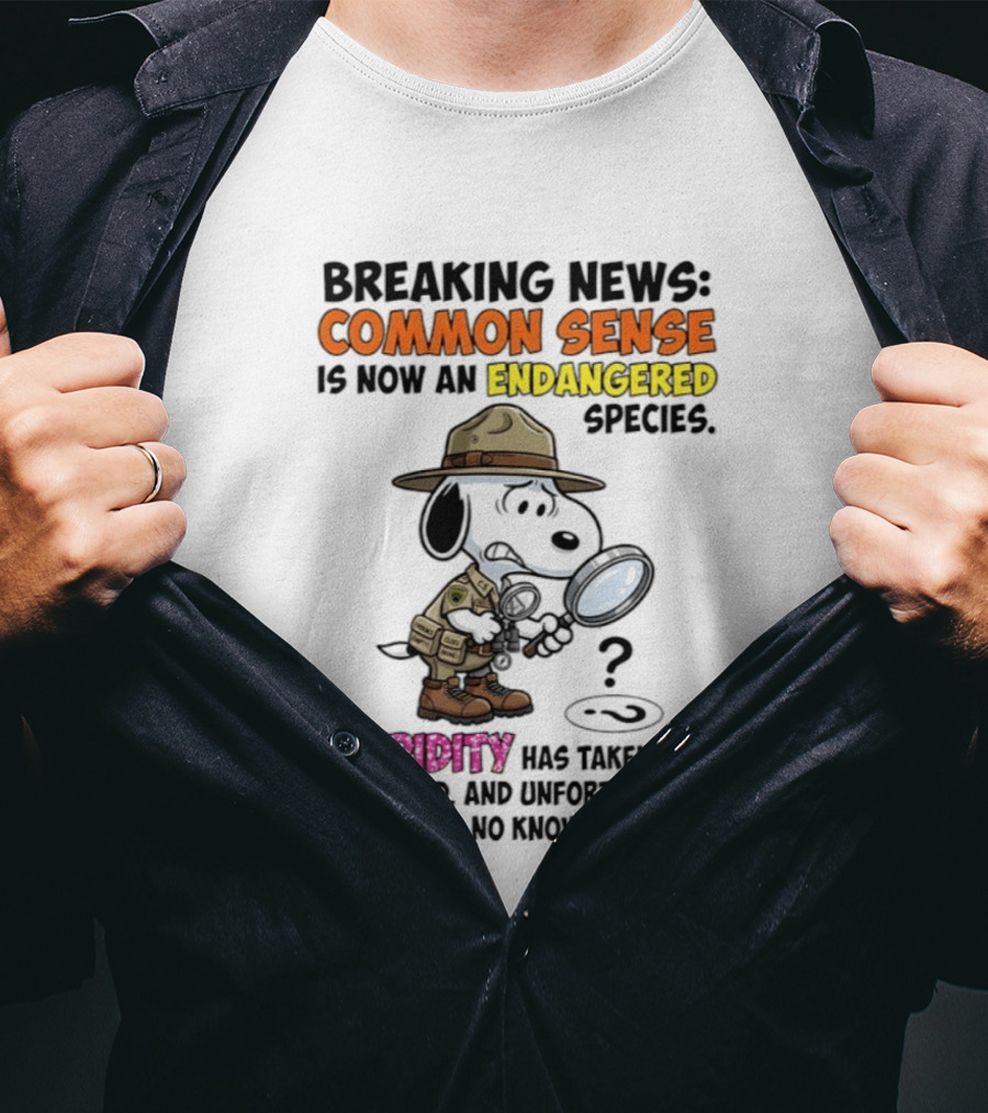 Breaking News Common Sense Endangered Species Stupidity Taken Over Snoopy T-Shirt