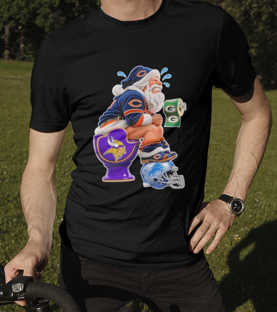 Santa Claus On Toilet Minnesota Vikings Detroit Lions Green Bay Packers Chicago Bears Funny Christmas 2026 Football T-Shirt