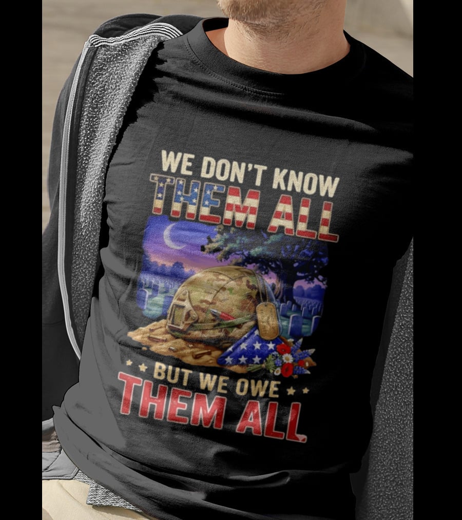 We Don't Know Them All But We Owe Them All Military Memorial Helmet And Flag Gravesite Scene T-Shirt