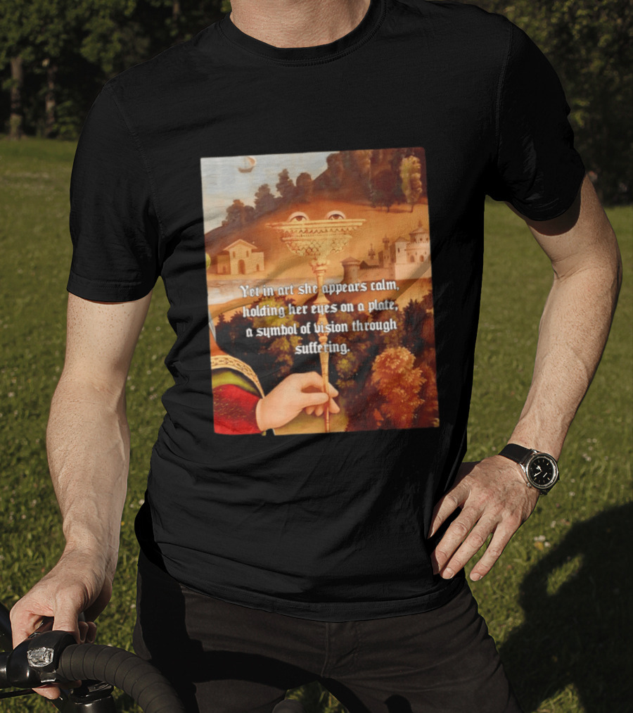 Yet In Art She Appears Calm Holding Her Eyes On A Plate A Symbol Of Vision Through Suffering T-Shirt