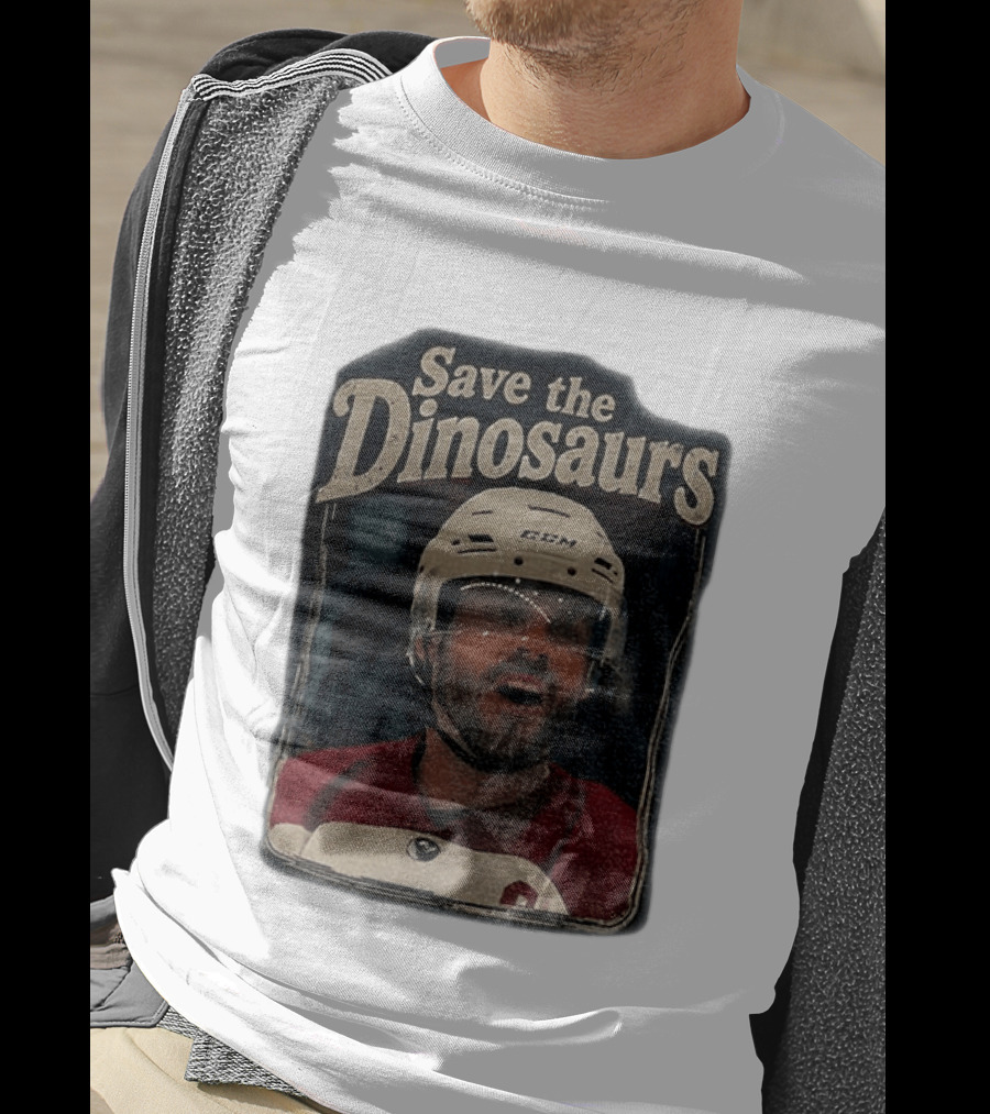 Connor Storrie Wearing Scott Hunter Save The Dinosaurs CCM Hockey T-Shirt