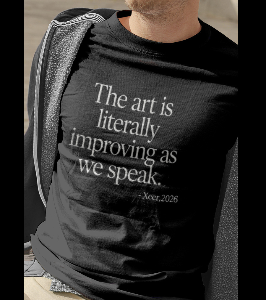 The Art Is Literally Improving As We Speak Xeer 2026 White Serif Black T-Shirt