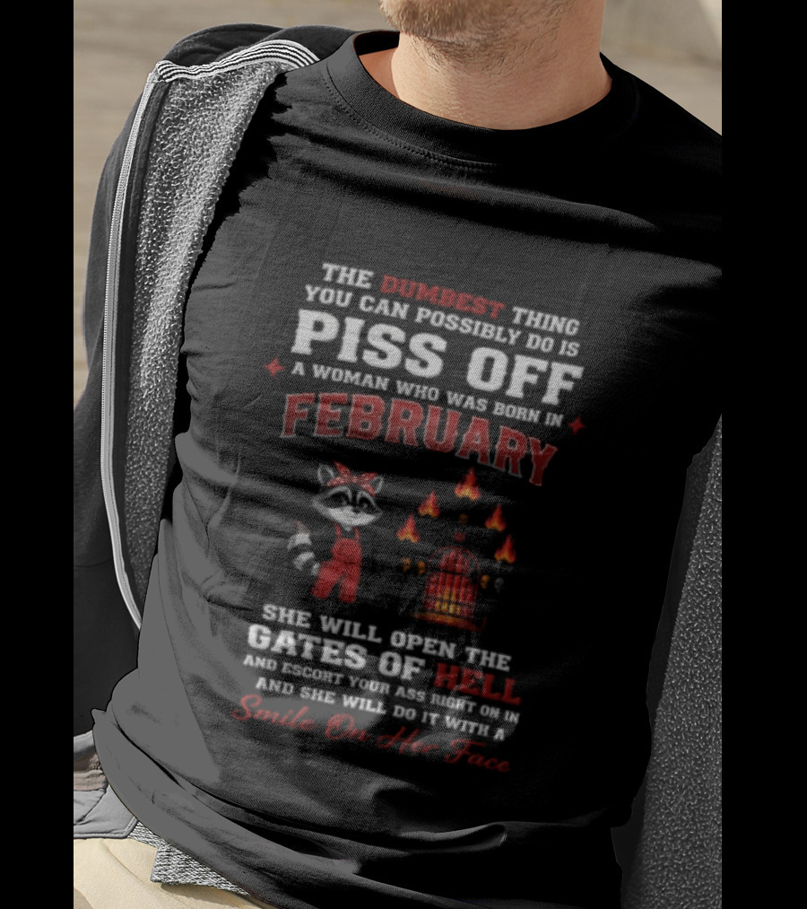 The Dumbest Thing You Can Possibly Do Is Piss Off A Woman Born In February Raccoon Gates Of Hell With A Smile On Her Face T-Shirt