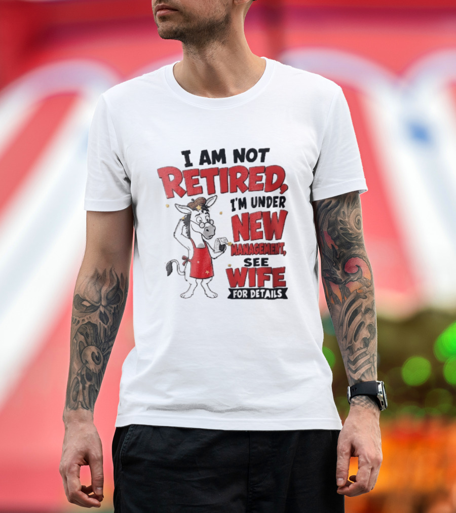 I Am Not Retired I'm Under New Management See Wife For Details Cartoon Donkey Red Apron T-Shirt