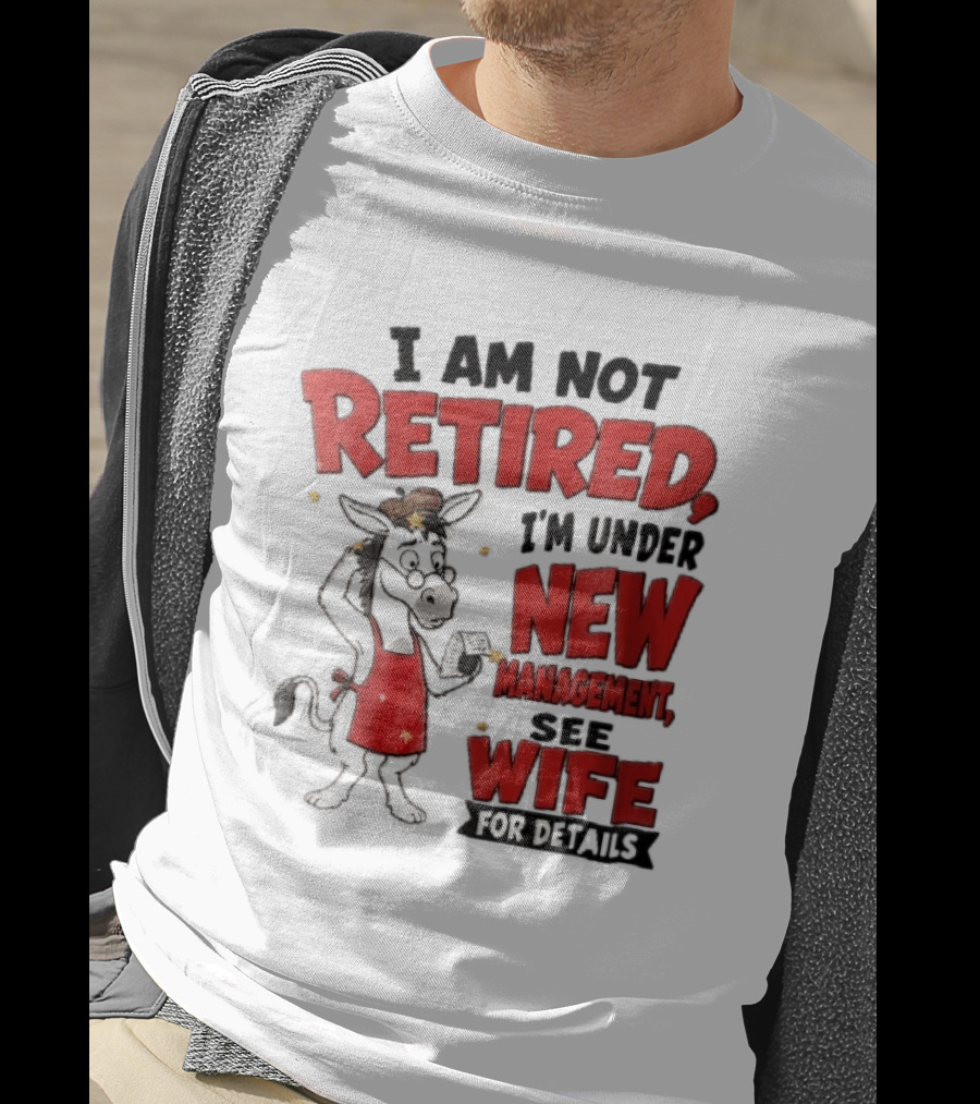 I Am Not Retired I'm Under New Management See Wife For Details Cartoon Donkey Red Apron T-Shirt