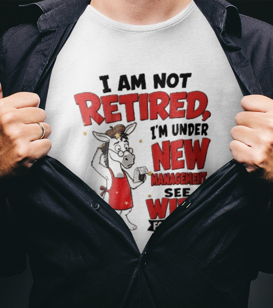 I Am Not Retired I'm Under New Management See Wife For Details Cartoon Donkey Red Apron T-Shirt