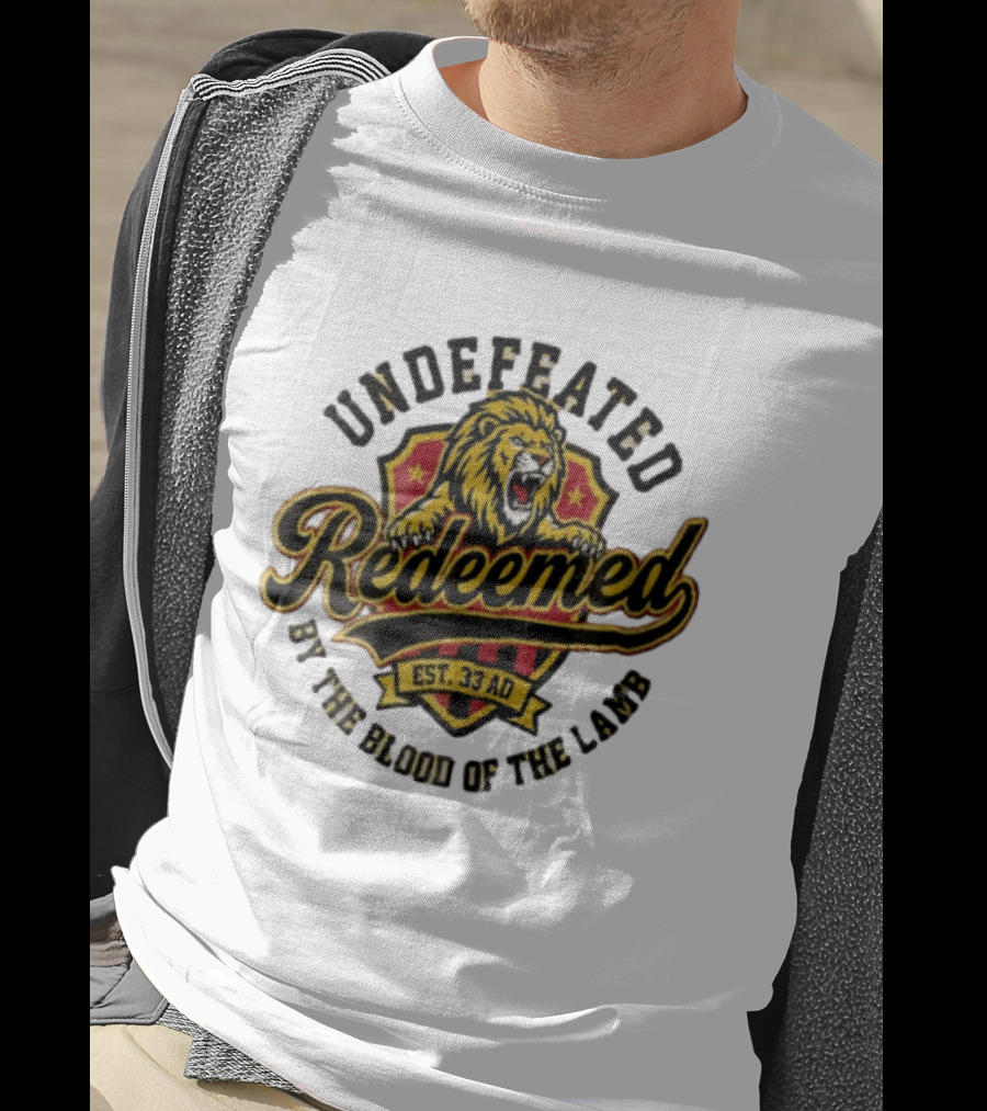 Undefeated Redeemed Lion Crest EST 33 AD By The Blood Of The Lamb T-Shirt