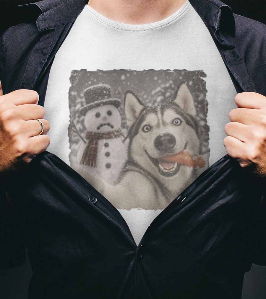 A Sled Dog With A Carrot And A Sad Snowman In A Snowy Winter Scene T-Shirt