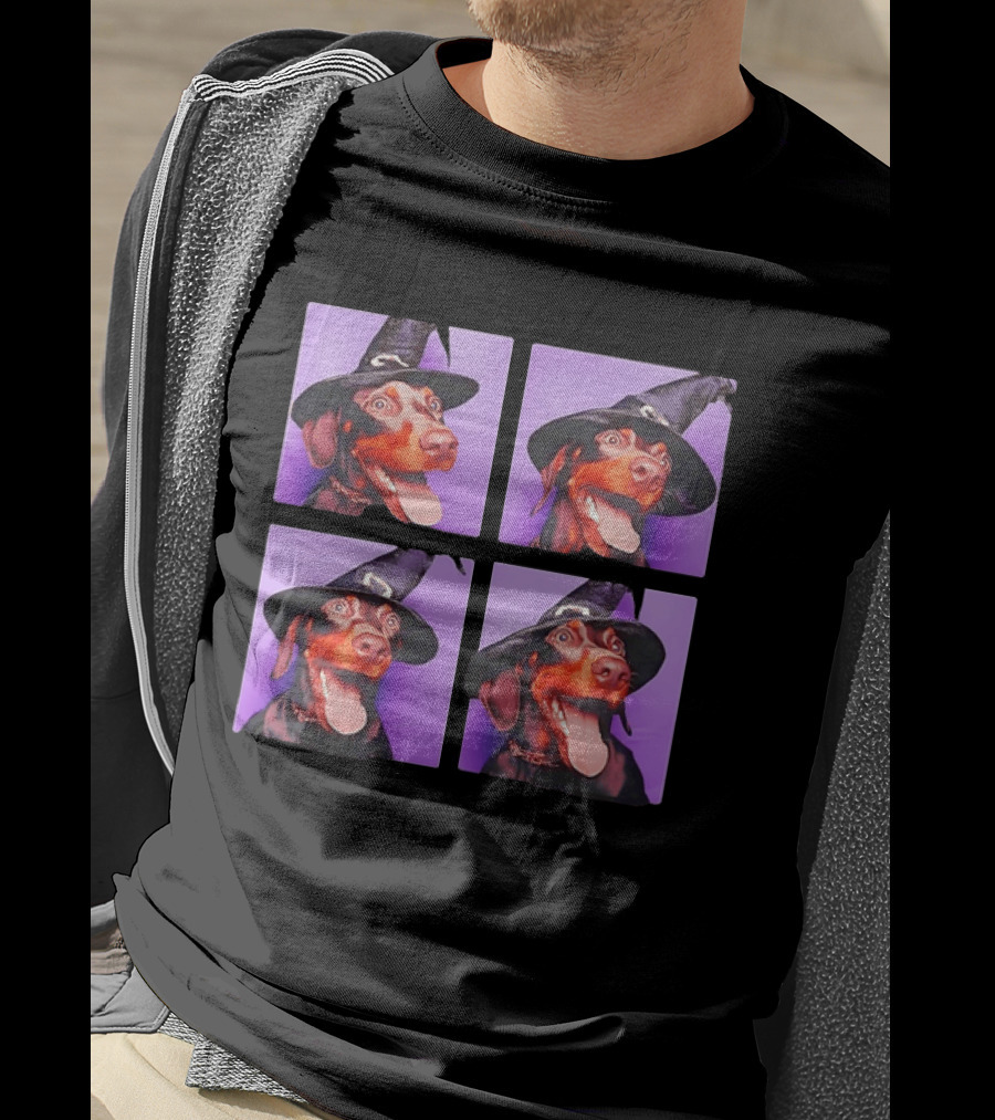 Doberman Pinscher In Witch Hat For Halloween With Purple T-Shirt