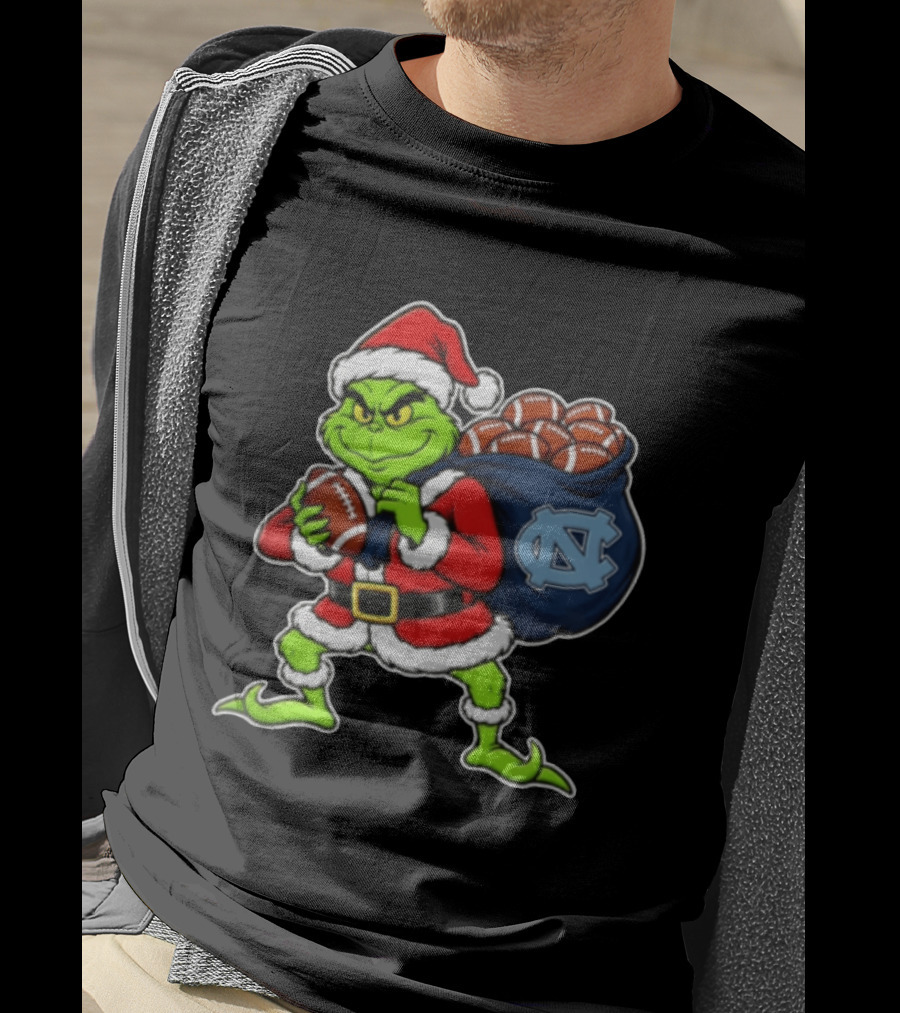 Grinch Santa North Carolina Tar Heels Holding Chiefs Footballs Christmas T-Shirt