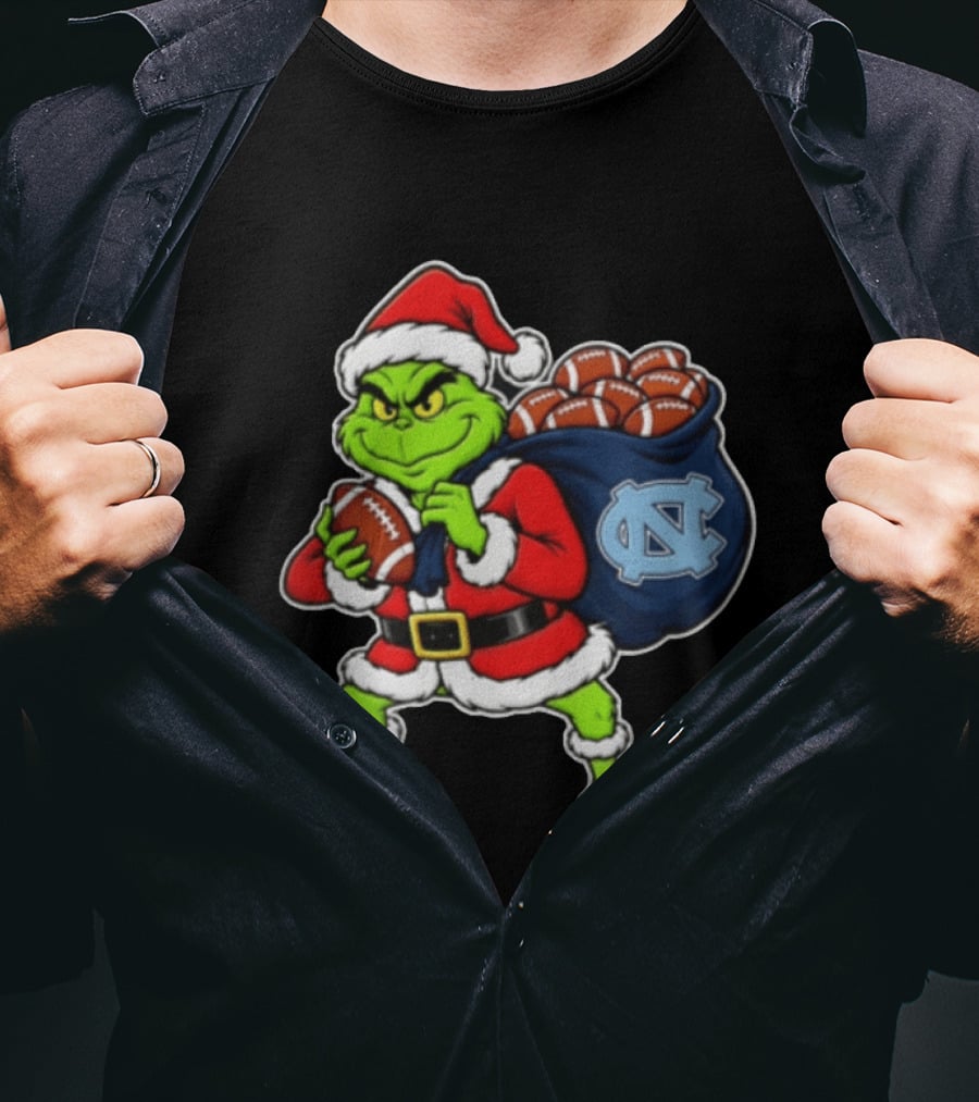 Grinch Santa North Carolina Tar Heels Holding Chiefs Footballs Christmas T-Shirt