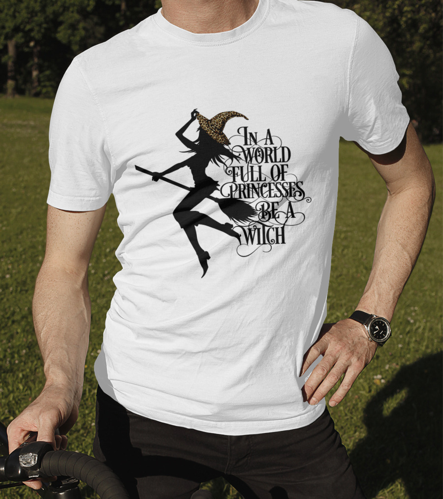 In A World Full Of Princesses Be A Witch Silhouette With Broom And Leopard Print Hat T-Shirt