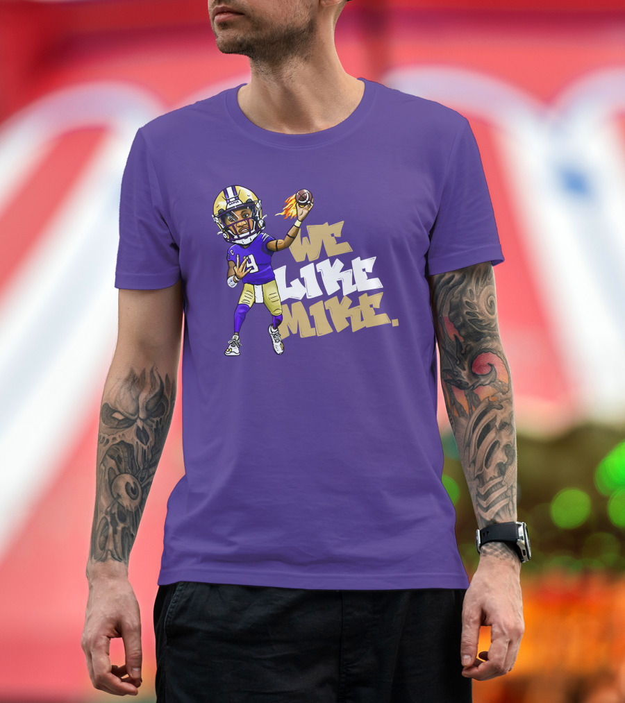 We Like Mike Football Character in Purple and Gold Gear Holding Flaming Ball T-Shirt