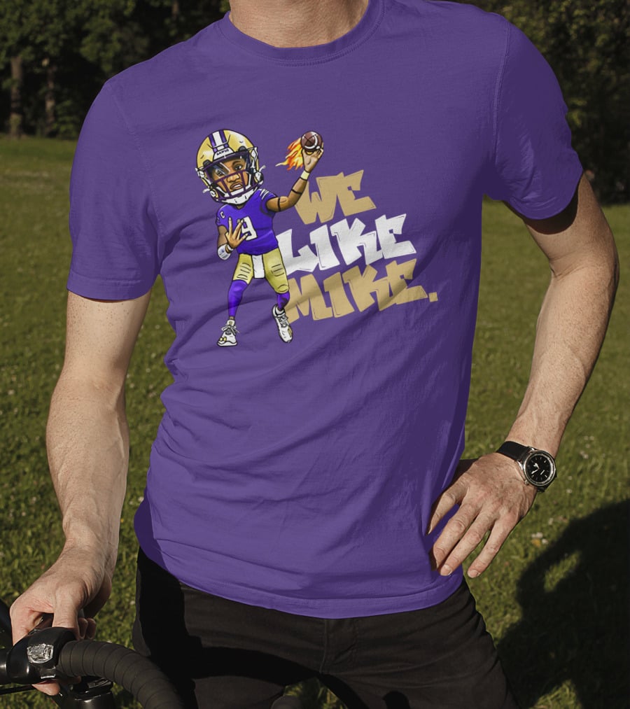 We Like Mike Football Character In Purple And Gold Gear Holding Flaming Ball T-Shirt