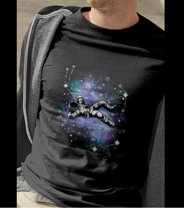 Floating Astronaut Amidst Cosmic Constellations T-Shirt