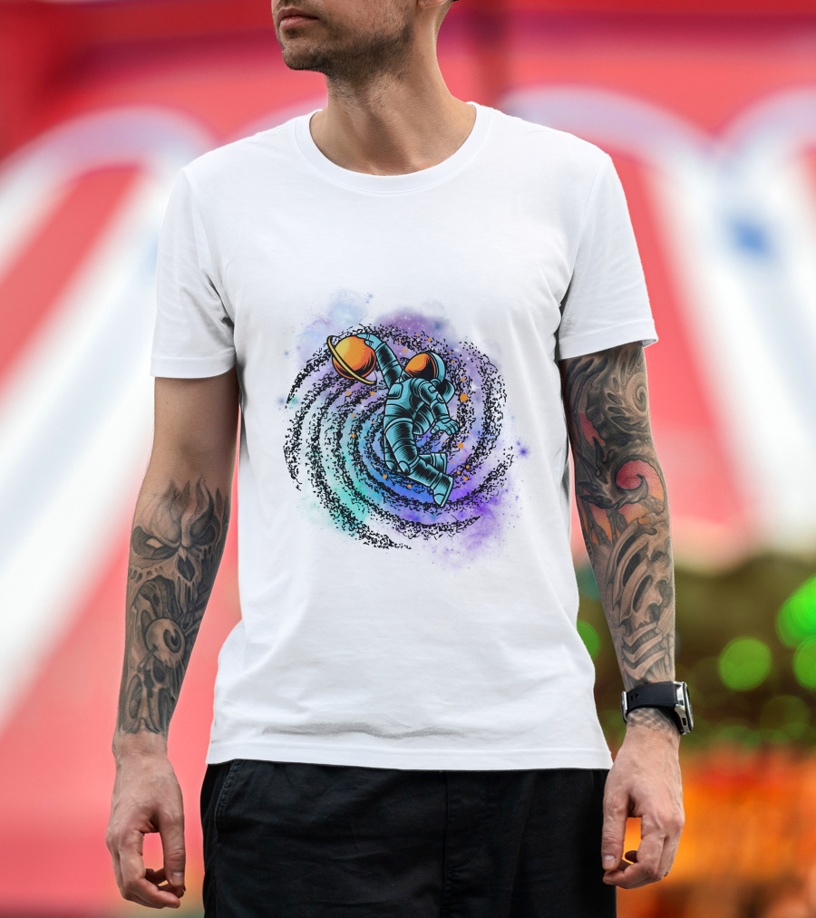 Astronaut Grasping Saturn in Cosmic Swirl 'Conquer the Universe' T-Shirt