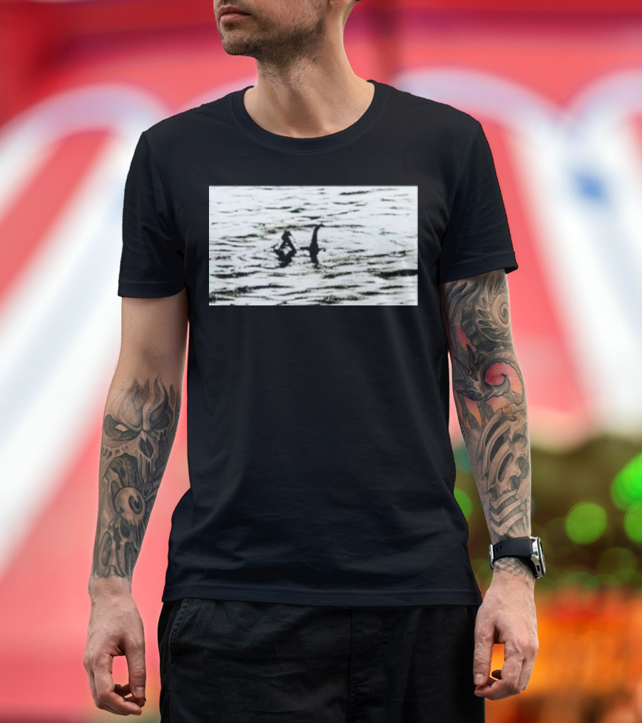Louis Wearing Palace Nessie Surfers on Loch Ness Monster T-Shirt