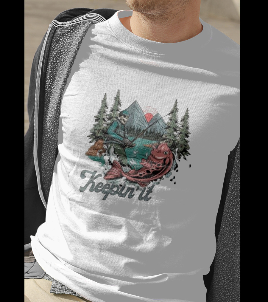 Keepin' It Reel Skeleton Fishing Adventure With Giant Fish And Mountain Lake Scene T-Shirt