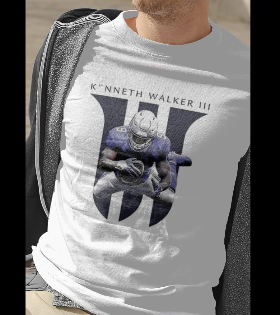 Kenneth Walker III Football Jump In Blue Uniform T-Shirt